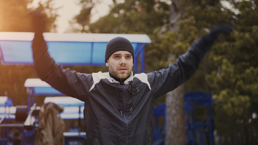 senior man stretching outdoors
