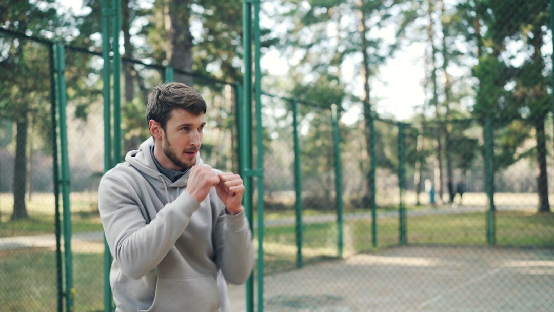 senior man stretching outdoors